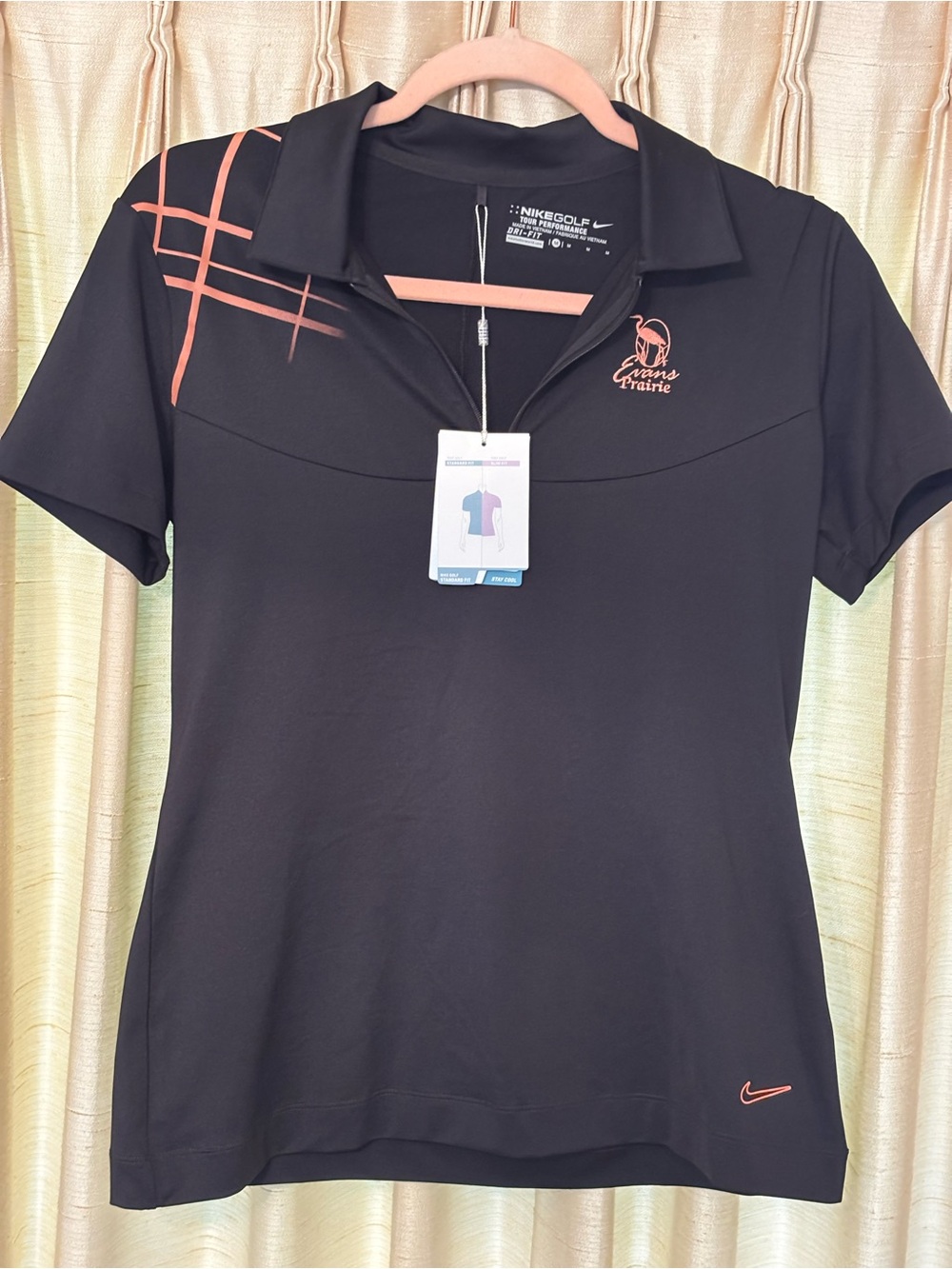 NWT! Woman’s medium. Nike Golf Dri-Fit Polo (Evans Prairie)